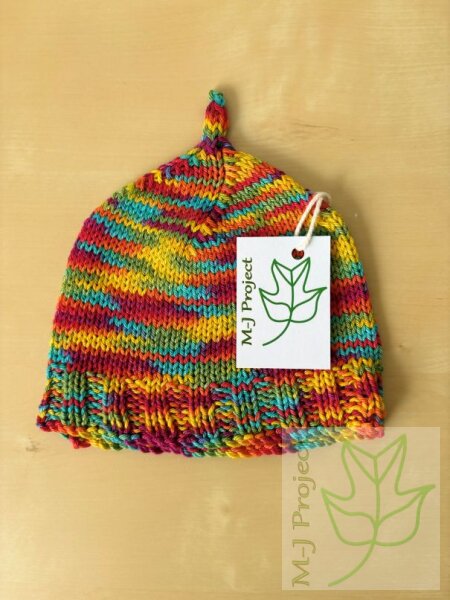 Hand-knitted rainbow baby hat